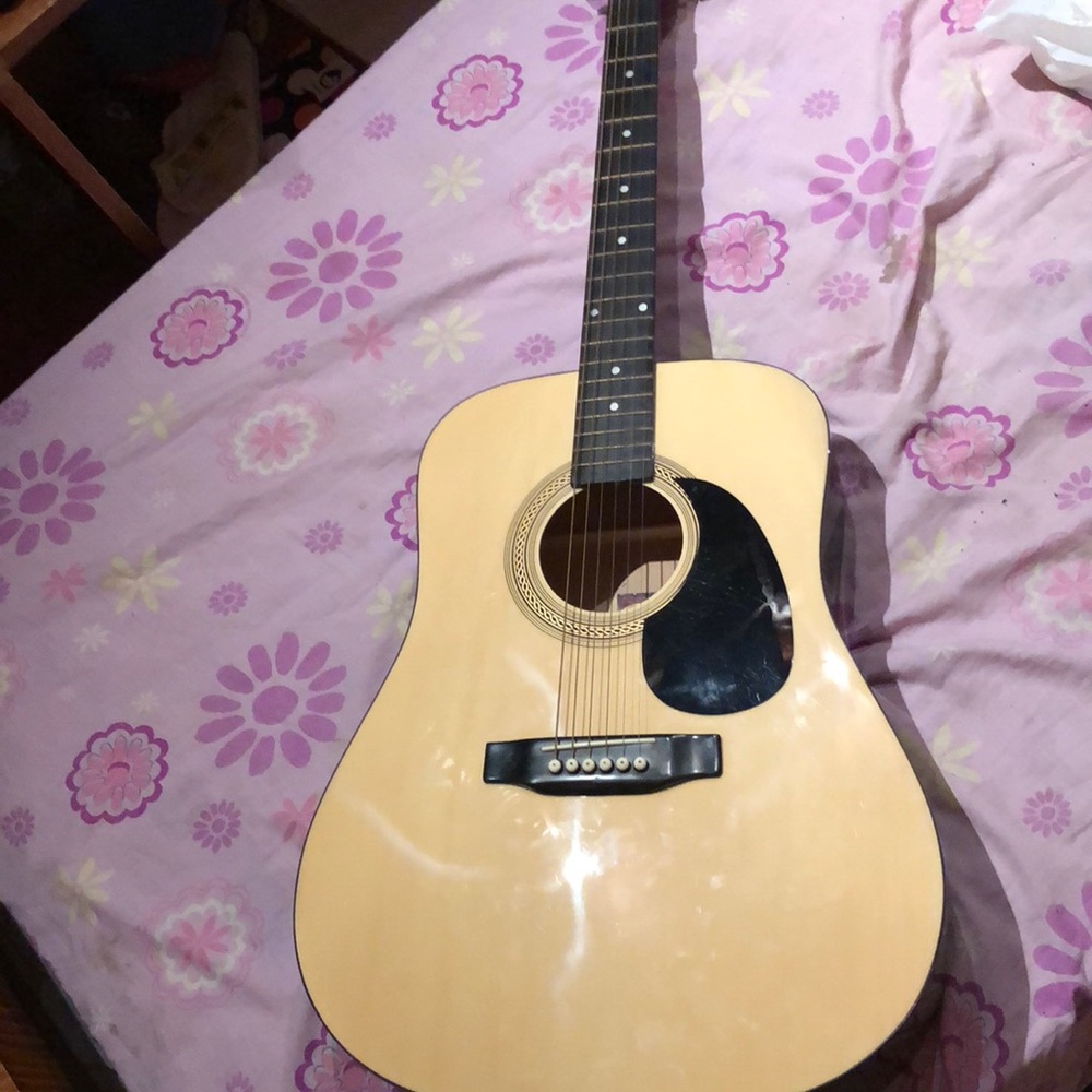 Guitar with free pick